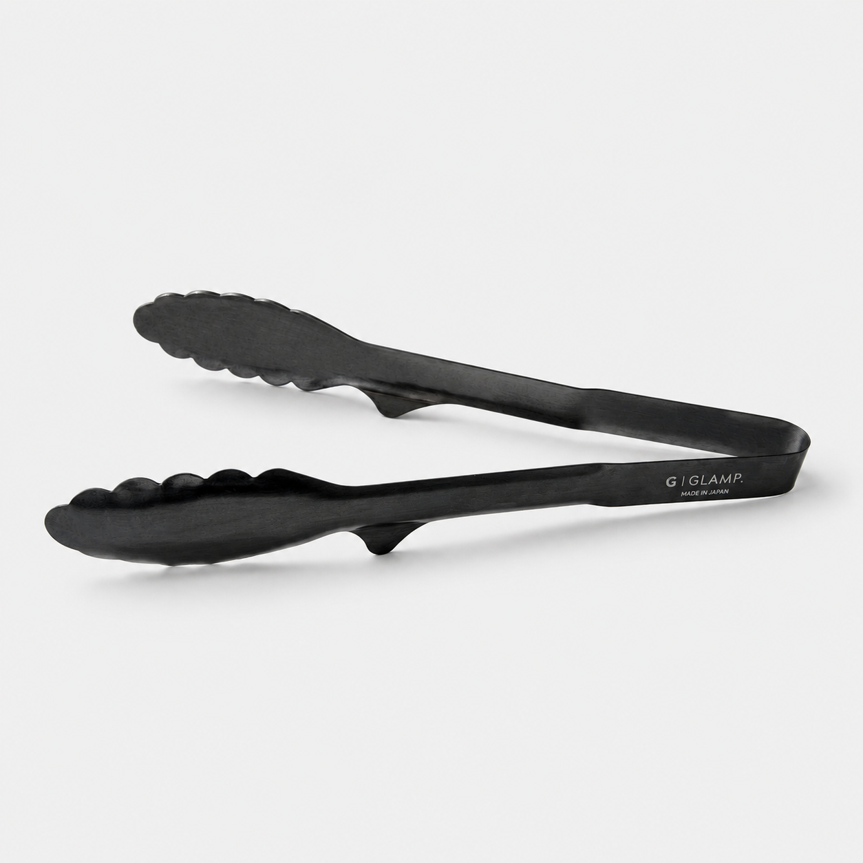 GLAMP. Stainless tongs